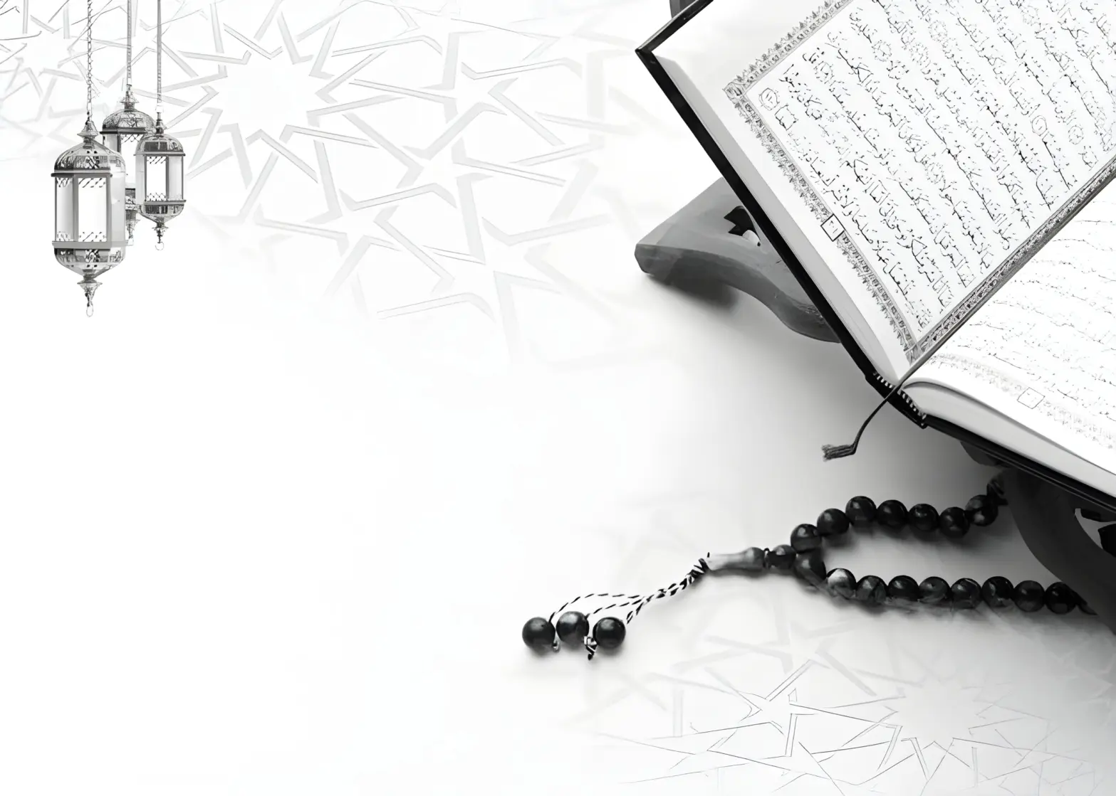 Open Qur'an with prayer beads and lanterns